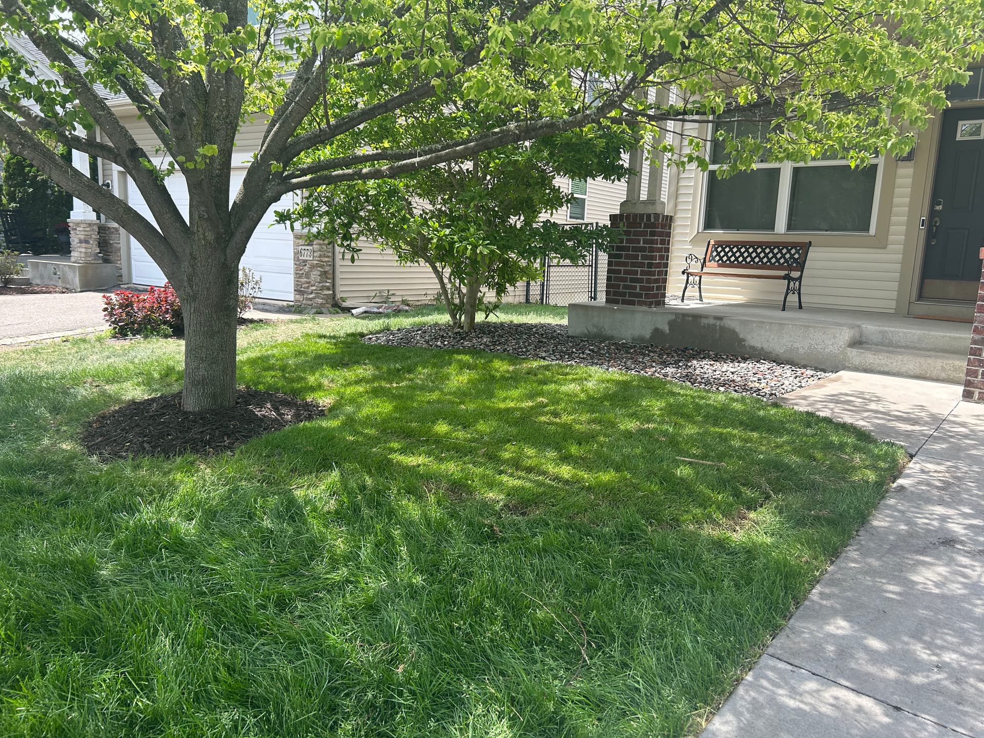 Landscape Bed Overhaul With Rock, Sod, and New Edging image